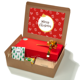 Feestdagenbox Merry Christmas met kerststol, biologische thee, roomboter en persoonlijke bedrukking.